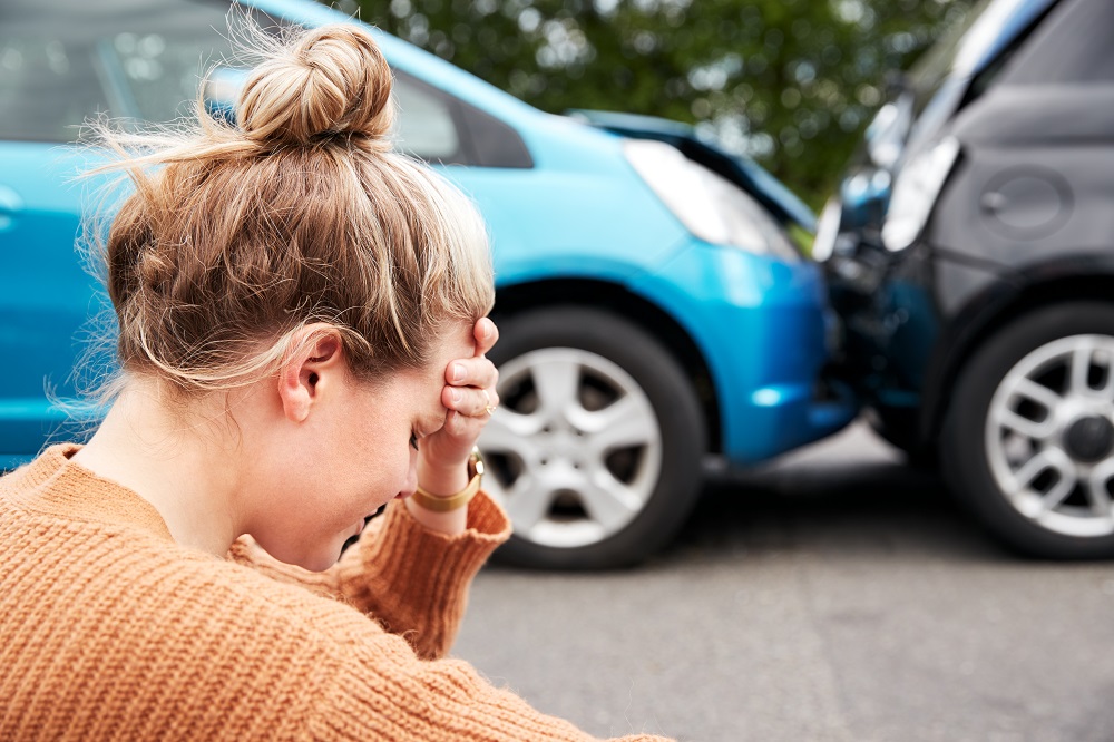 Worried uninsured driver after an accident.