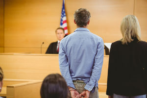 felony defense lawyer with client