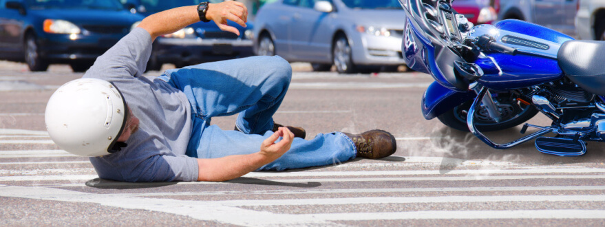 man knocked off motorcycle after a crash